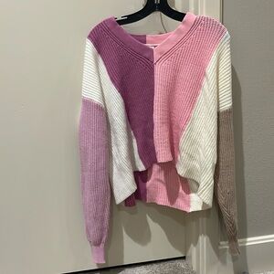Multi colored sweeter that I bought at Francesca’s, lightly worn, few snags